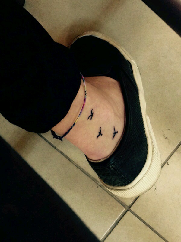 feet tatttoo women